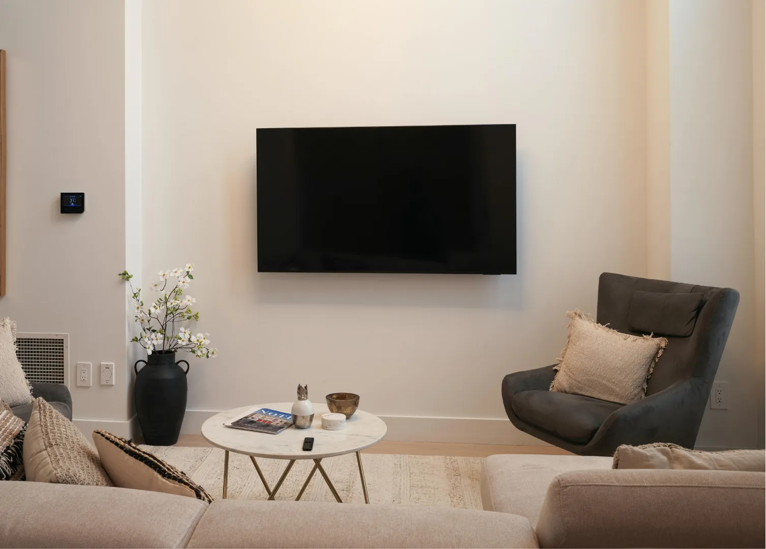 Professionally wall mounted television in a modern living room